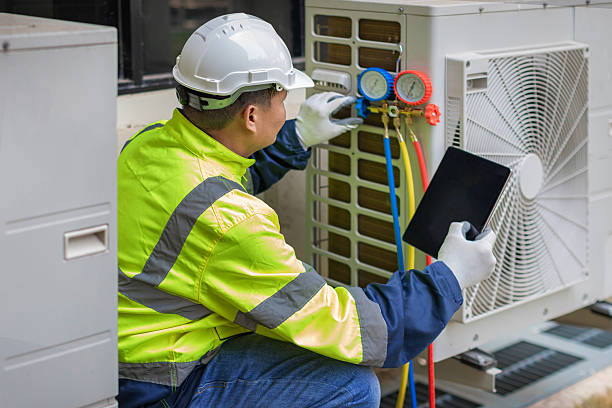 Professional Hvac technician working in Plano, TX